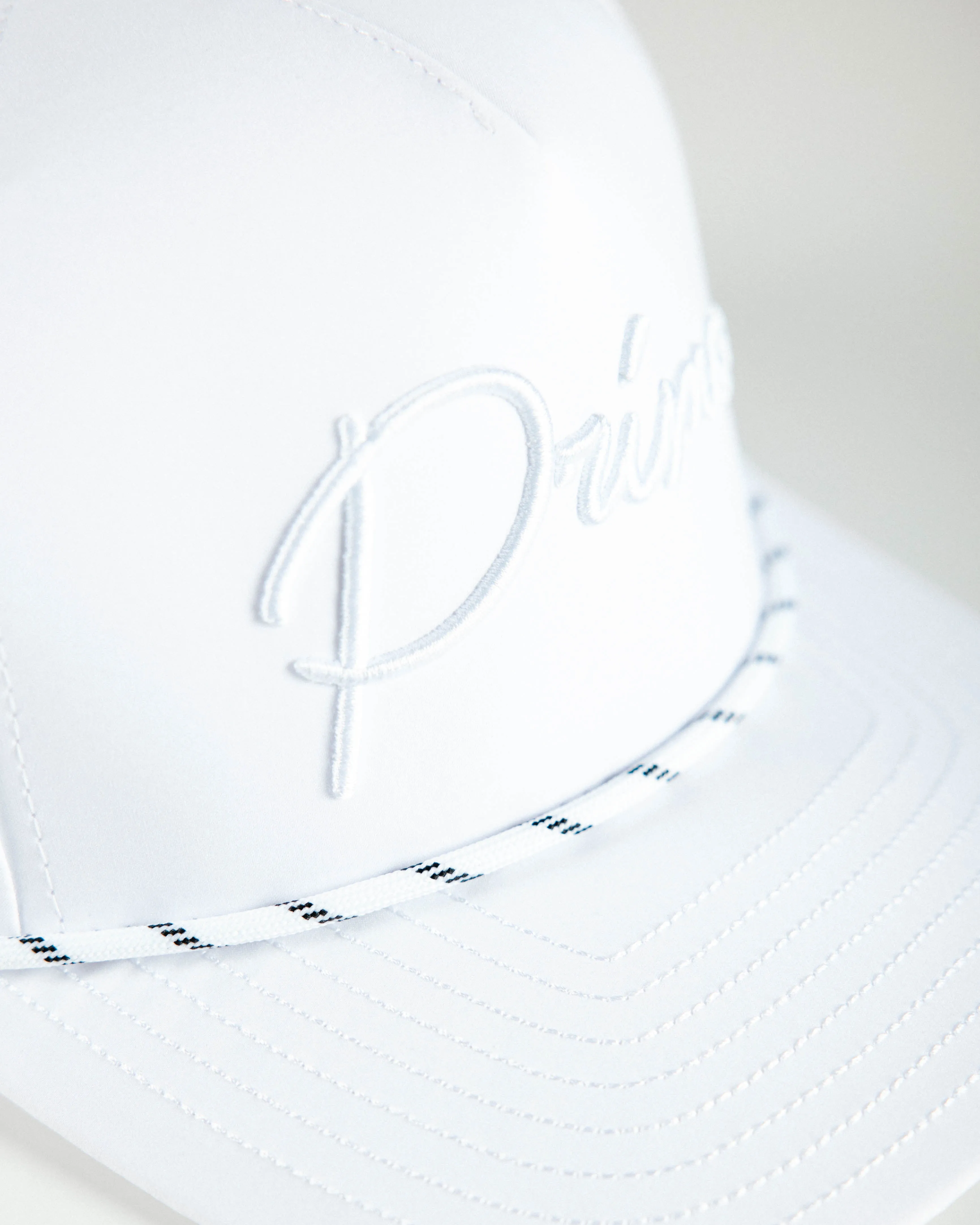 White Cursive Hat with Whiteout Design