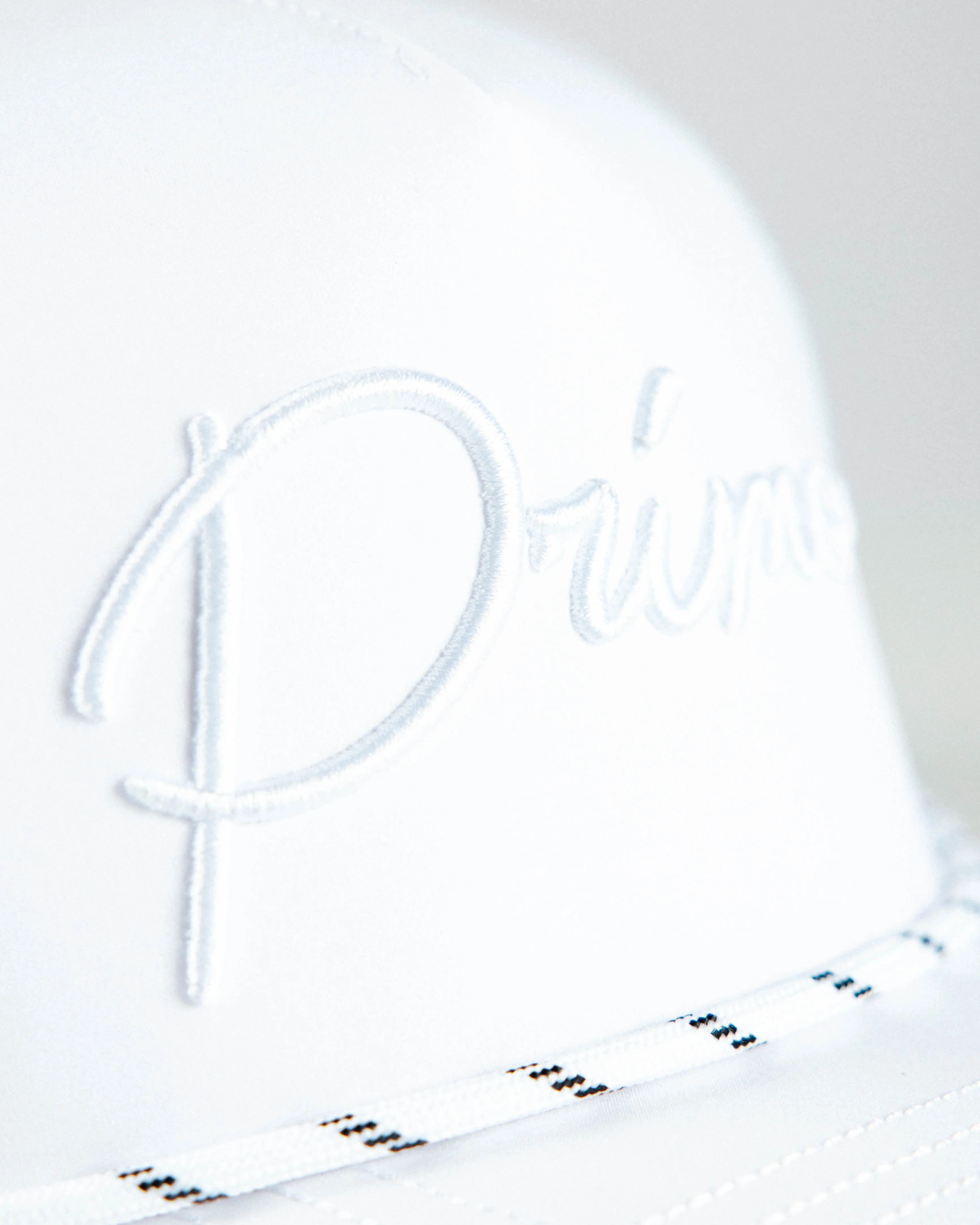 White Cursive Hat with Whiteout Design